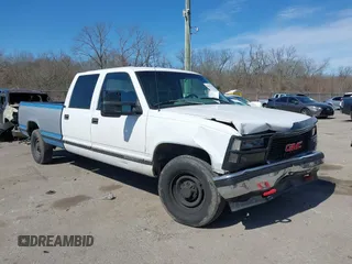 1996 GMC Sierra 1500 with VIN 1GTGC33R4TF018147, listed as a IAAI auction lot 41612770 with 106,443 mi miles and . Bid and sale history available at DreamBid. Image 1.