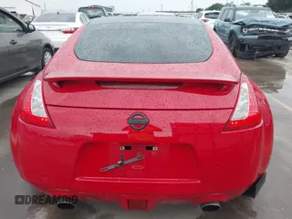 2016 Nissan 370Z z VIN JN1AZ4EHXGM932681, wystawiony jako IAAI lot #42350850 z przebiegiem 94 586 mil mil oraz . Historia ofert i sprzedaży dostępna na DreamBid. Obrazek 16.