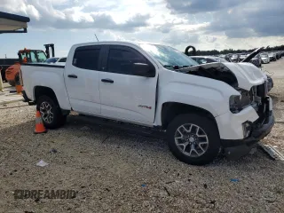 2022 GMC Canyon 4WD AT4 w/Cloth with VIN 1GTG6FEN7N1264287, listed as a Copart auction lot 72190154 with 30,694 mi miles and Salvage Title. Bid and sale history available at carsss.com. Image 4.