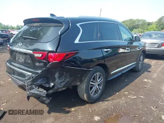 2020 Infiniti QX60 Pure with VIN 5N1DL0MM1LC501807, listed as a IAAI auction lot 42447446 with 37,184 mi miles and . Bid and sale history available at DreamBid. Image 4.