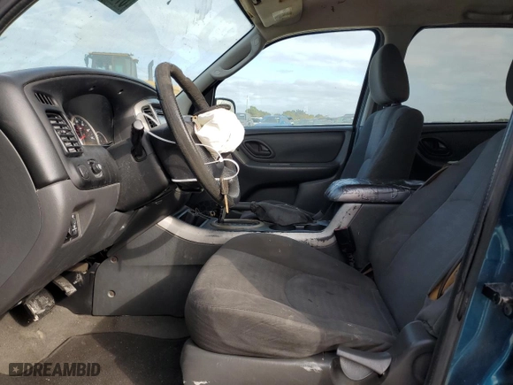 2005 Mazda Tribute i with VIN 4F2YZ02Z35KM11408, listed as a Copart auction lot 87746585 with 194,034 mi miles and Salvage Title. Bid and sale history available at carsss.com. Image 7.