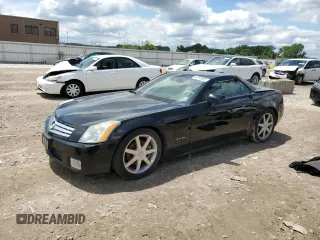2006 Cadillac XLR z VIN 1G6YV36A965601654, wystawiony jako Copart lot #58758005 z przebiegiem Nie podano mil oraz Czysty tytuł • Clean title. Historia ofert i sprzedaży dostępna na DreamBid. Obrazek 1.