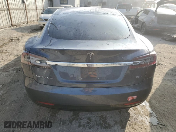 2017 Tesla Model S 100D z VIN 5YJSA1E27HF206144, wystawiony jako Copart lot #87453654 z przebiegiem Nie podano mil oraz Szkoda całkowita • Salvage title. Historia ofert i sprzedaży dostępna na DreamBid. Obrazek 6.