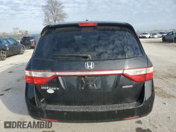 2012 Honda Odyssey Touring with VIN 5FNRL5H9XCB022284, listed as a Copart auction lot 82766824 with Not provided miles and Salvage title. Bid and sale history available at DreamBid. Image 6.