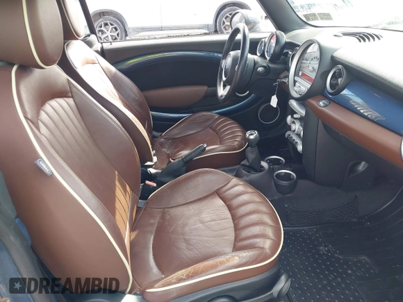 2010 MINI Convertible with VIN WMWMR3C50ATZ18845, listed as a IAAI auction lot 41394025 with 78,872 mi miles and . Bid and sale history available at DreamBid. Image 5.