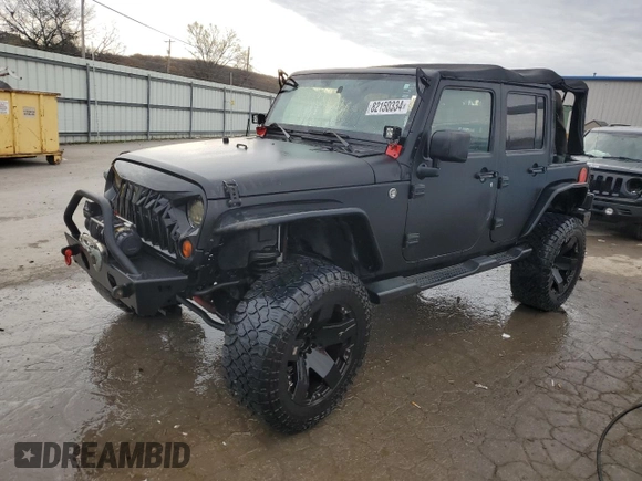 2007 Jeep Wrangler Unlimited X with VIN 1J4GA391X7L171902, listed as a Copart auction lot 82150334 with 167,695 mi miles and Salvage title. Bid and sale history available at DreamBid. Image 1.