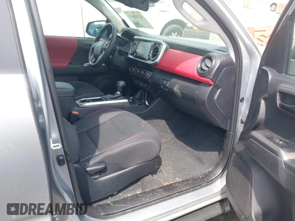 2023 Toyota Tacoma SR with VIN 3TYCZ5AN2PT176554, listed as a IAAI auction lot 42148651 with 15,255 mi miles and . Bid and sale history available at DreamBid. Image 5.