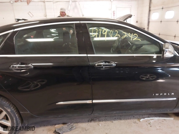 2015 Chevrolet Impala LTZ with VIN 2G1165S38F9145916, listed as a IAAI auction lot 41982242 with 303,316 mi miles. Bid and sale history available at carsss.com. Image 13.