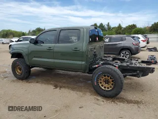 2022 Toyota Tacoma SR with VIN 3TMCZ5AN3NM511541, listed as a Copart auction lot 56299195 with 33,427 mi miles and Salvage title. Bid and sale history available at DreamBid. Image 2.
