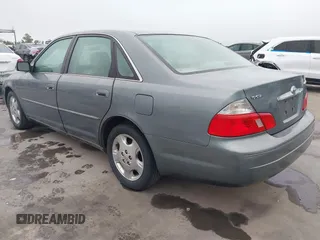 2004 Toyota Avalon XL with VIN 4T1BF28B94U387764, listed as a IAAI auction lot 42162419 with 306,611 mi miles and . Bid and sale history available at carsss.com. Image 3.