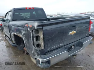 2014 Chevrolet Silverado 1500 LT with VIN 1GCVKREC2EZ149018, listed as a IAAI auction lot 41403200 with 153,760 mi miles and . Bid and sale history available at DreamBid. Image 3.