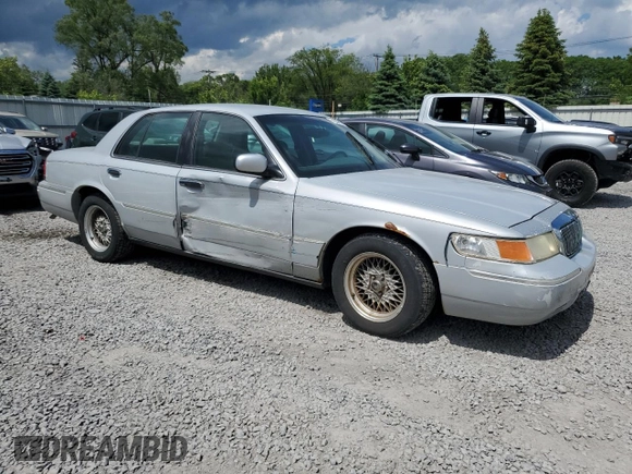 2000 Mercury Grand Marquis LS z VIN 2MEFM75W8YX614309, wystawiony jako Copart lot #61229915 z przebiegiem 228 527 mil mil oraz Szkoda całkowita • Salvage title. Historia ofert i sprzedaży dostępna na DreamBid. Obrazek 4.