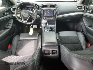 2017 Nissan Maxima SL with VIN 1N4AA6AP6HC432009, listed as a Copart auction lot 65593765 with 32,518 mi miles and Salvage title. Bid and sale history available at DreamBid. Image 8.