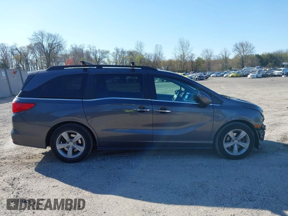 2020 Honda Odyssey EX with VIN 5FNRL6H54LB052660, listed as a IAAI auction lot 42051157 with 51,159 mi miles and . Bid and sale history available at DreamBid. Image 13.