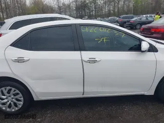 2019 Toyota Corolla L with VIN 5YFBURHE6KP937090, listed as a IAAI auction lot 42041637 with 129,138 mi miles. Bid and sale history available at carsss.com. Image 13.