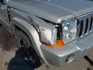 2007 Jeep Commander Sport z VIN 1J8HG48K07C559271, wystawiony jako IAAI lot #42032853 z przebiegiem 236 443 mil mil oraz . Historia ofert i sprzedaży dostępna na DreamBid. Obrazek 6.