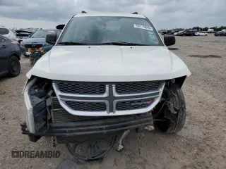 2014 Dodge Journey SE with VIN 3C4PDCAB7ET240936, listed as a Copart auction lot 55115645 with 242,155 mi miles and Salvage title. Bid and sale history available at DreamBid. Image 5.