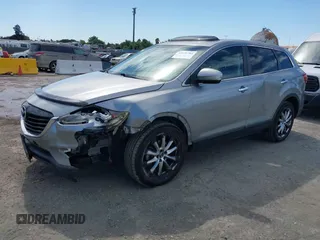 2014 Mazda CX-9 Grand Touring z VIN JM3TB2DVXE0432991, wystawiony jako IAAI lot #42826784 z przebiegiem 134 265 mil mil oraz . Historia ofert i sprzedaży dostępna na DreamBid. Obrazek 17.