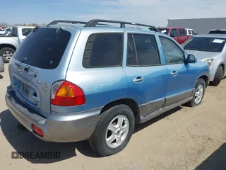 2004 Hyundai Santa Fe GLS z VIN KM8SC73E54U782368, wystawiony jako IAAI lot #42379772 z przebiegiem 120 244 mil mil oraz . Historia ofert i sprzedaży dostępna na DreamBid. Obrazek 4.