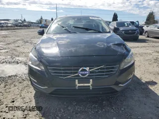 2014 Volvo S60 T5 z VIN YV1612FS0E2295344, wystawiony jako Copart lot #50101125 z przebiegiem 75 959 mil mil oraz Szkody całkowita. Historia ofert i sprzedaży dostępna na DreamBid. Obrazek 5.