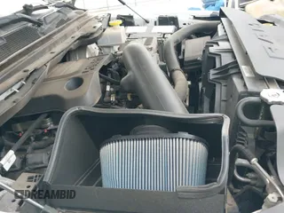 2020 Ram 1500 Big Horn z VIN 1C6SRFFT2LN369248, wystawiony jako IAAI lot #42623621 z przebiegiem 68 819 mil mil oraz . Historia ofert i sprzedaży dostępna na DreamBid. Obrazek 19.