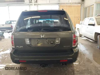 2006 Honda Pilot EX-L with VIN 5FNYF187X6B026463, listed as a IAAI auction lot 41612181 with 242,828 mi miles and . Bid and sale history available at DreamBid. Image 16.