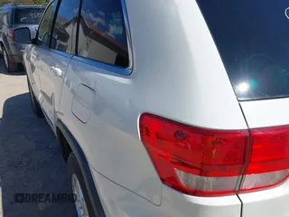 2011 Jeep Grand Cherokee Laredo with VIN 1J4RR4GG9BC556083, listed as a IAAI auction lot 42139453 with 145,623 mi miles and . Bid and sale history available at DreamBid. Image 13.