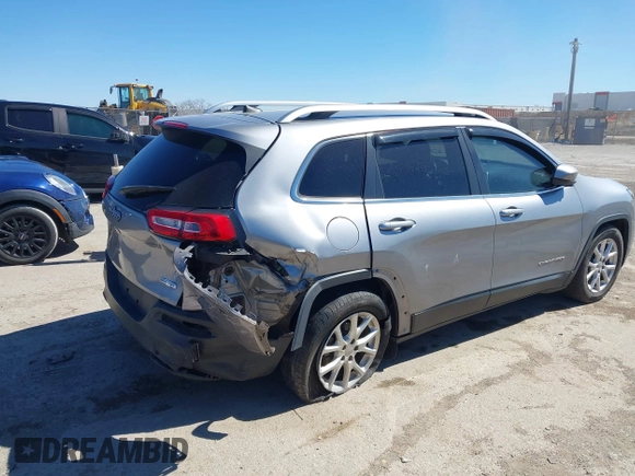 2016 Jeep Cherokee 75th Anniversary with VIN 1C4PJLCB1GW217638, listed as a IAAI auction lot 41689623 with 124,630 mi miles and . Bid and sale history available at DreamBid. Image 4.