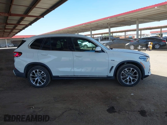 2023 BMW X5 xDrive45e z VIN 5UXTA6C08P9P19395, wystawiony jako IAAI lot #42272149 z przebiegiem 3 281 mil mil oraz . Historia ofert i sprzedaży dostępna na DreamBid. Obrazek 13.