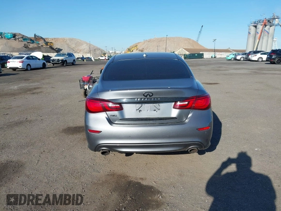 2015 Infiniti Q70 z VIN JN1BY1AR5FM561996, wystawiony jako IAAI lot #42099091 z przebiegiem 115 080 mil mil oraz . Historia ofert i sprzedaży dostępna na DreamBid. Obrazek 15.