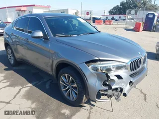 2015 BMW X6 xDrive50i with VIN 5UXKU6C52F0F94060, listed as a IAAI auction lot 41299202 with 67,835 mi miles. Bid and sale history available at carsss.com. Image 1.