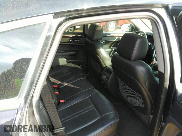 2016 Cadillac SRX Performance Collection z VIN 3GYFNCE32GS505552, wystawiony jako IAAI lot #40949642 z przebiegiem 143 343 mil mil oraz . Historia ofert i sprzedaży dostępna na DreamBid. Obrazek 8.
