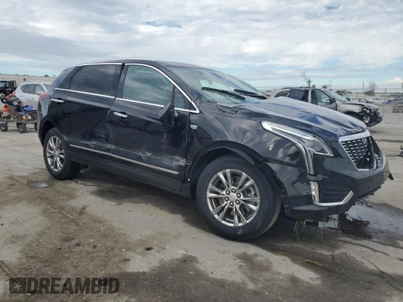 2023 Cadillac XT5 FWD Premium Luxury with VIN 1GYKNCRS0PZ138704, listed as a Copart auction lot 86849104 with 44,398 mi miles and Non Repairable. Bid and sale history available at carsss.com. Image 4.