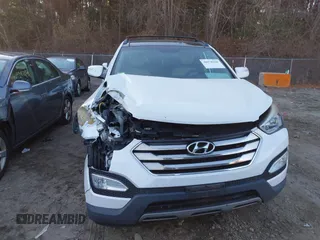 2014 Hyundai Santa Fe with VIN 5XYZUDLB4EG129473, listed as a IAAI auction lot 40978108 with 169,997 mi miles and . Bid and sale history available at DreamBid. Image 12.