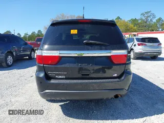 2013 Dodge Durango SXT with VIN 1C4RDJAG2DC617983, listed as a IAAI auction lot 41805992 with 210,560 mi miles and . Bid and sale history available at carsss.com. Image 16.