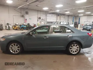 2012 Lincoln MKZ z VIN 3LNHL2GC1CR837698, wystawiony jako IAAI lot #41877061 z przebiegiem 129 411 mil mil oraz . Historia ofert i sprzedaży dostępna na DreamBid. Obrazek 14.