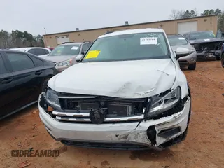 2021 Volkswagen Tiguan S z VIN 3VV1B7AX6MM077365, wystawiony jako IAAI lot #41762764 z przebiegiem 46 338 mil mil oraz . Historia ofert i sprzedaży dostępna na DreamBid. Obrazek 12.