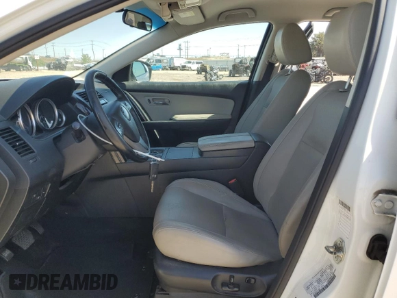 2015 Mazda CX-9 Touring with VIN JM3TB2CV0F0462911, listed as a Copart auction lot 56048625 with 174,732 mi miles and Salvage Title. Bid and sale history available at DreamBid. Image 7.