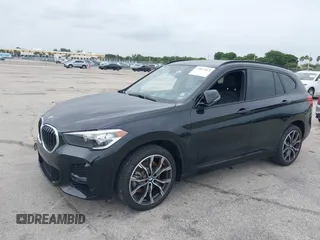 2021 BMW X1 sDrive28i with VIN WBXJG7C05M5U03116, listed as a IAAI auction lot 39837867 with 16,788 mi miles. Bid and sale history available at carsss.com. Image 2.