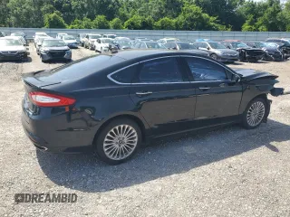 2016 Ford Fusion Titanium with VIN 3FA6P0K91GR118916, listed as a Copart auction lot 55839735 with 83,553 mi miles and Salvage title. Bid and sale history available at DreamBid. Image 3.