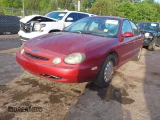 1996 Ford Taurus LX with VIN 1FALP53S2TA311839, listed as a IAAI auction lot 42171689 with 150,116 mi miles and . Bid and sale history available at DreamBid. Image 2.