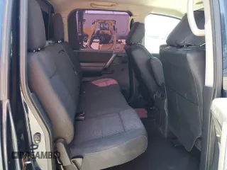 2012 Nissan Titan SV with VIN 1N6AA0ED3CN331091, listed as a Copart auction lot 57805625 with 106,693 mi miles and Salvage title. Bid and sale history available at DreamBid. Image 10.