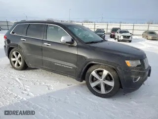 2014 Jeep Grand Cherokee Overland with VIN 1C4RJFCM4EC318893, listed as a Copart auction lot 42163465 with 153,678 mi miles and Clean Title. Bid and sale history available at carsss.com. Image 4.