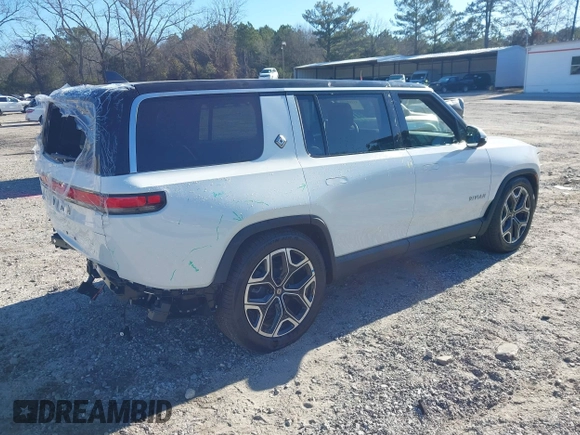 2025 Rivian R1S Adventure with VIN 7PDSGBBA0SN049154, listed as a IAAI auction lot 41160166 with 3,036 mi miles. Bid and sale history available at carsss.com. Image 4.