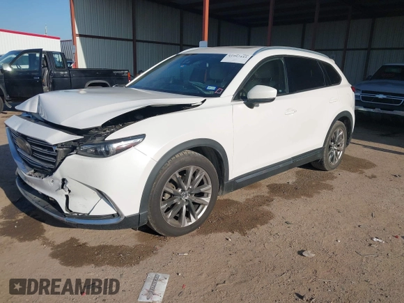 2016 Mazda CX-9 Grand Touring z VIN JM3TCADY6G0125547, wystawiony jako IAAI lot #41997445 z przebiegiem 129 179 mil mil oraz . Historia ofert i sprzedaży dostępna na DreamBid. Obrazek 2.