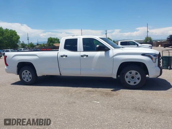 2022 Toyota Tundra with VIN 5TFKB5CDXNX001458, listed as a IAAI auction lot 42640278 with 51,718 mi miles and . Bid and sale history available at DreamBid. Image 13.
