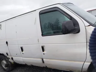 2004 Ford Econoline Cargo with VIN 1FTSS34L84HA56056, listed as a IAAI auction lot 41235862 with 215,095 mi miles and . Bid and sale history available at DreamBid. Image 13.