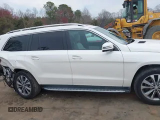 2016 Mercedes-Benz GL with VIN 4JGDF6EE7GA673861, listed as a IAAI auction lot 41803302 with 74,670 mi miles. Bid and sale history available at carsss.com. Image 13.