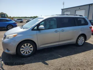 2015 Toyota Sienna Limited with VIN 5TDDK3DC4FS111836, listed as a Copart auction lot 61940595 with 111,579 mi miles and Salvage title. Bid and sale history available at DreamBid. Image 1.