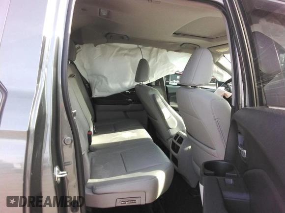 2019 Honda Ridgeline RTL-T with VIN 5FPYK3F64KB013498, listed as a Copart auction lot 44334195 with 104,197 mi miles and Salvage title. Bid and sale history available at DreamBid. Image 11.